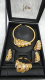 Elegant Dubai Gold-Plated Statement Necklace Set with Sculptural Coil Design – Matching Bracelet, Ring & Earrings
