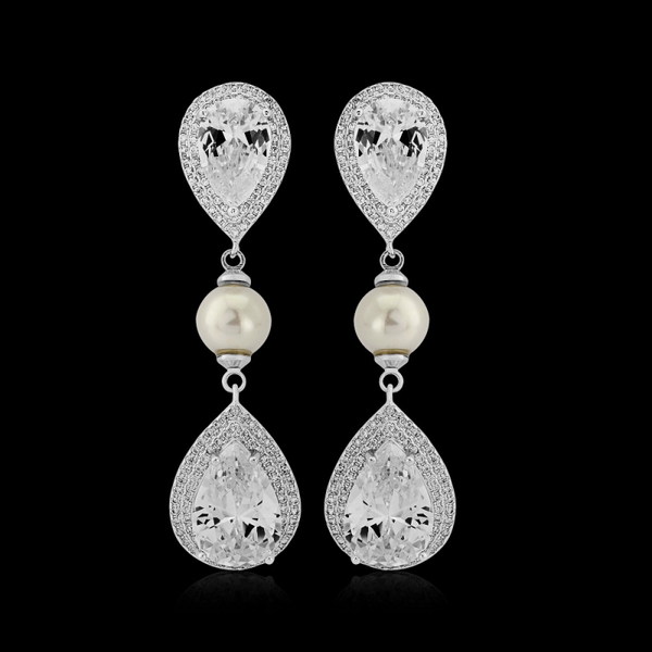 A pretty pair of crystal and pearl drop wedding earrings in a dainty design, featuring a single row of twinkling clear CZ stones, finished with a shimmering ivory pearl. Perfect for both brides and bridesmaids.